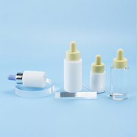 Nouveau conçu 30ml 15ml verre/bouteille en verre opale avec compte-gouttes pour l'emballage de soins de la peau cosmétique de luxe