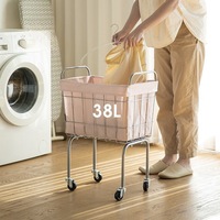 Panier à linge en acier au carbone de grande capacité avec roulettes lisses et durables pour vêtements sales