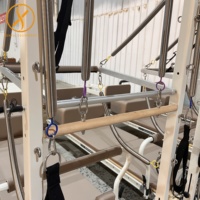 Suministro de fábrica Equipo de gimnasio Reformador de Pilates de aluminio con media torre de trapecio