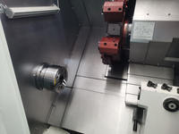 Tour CNC à lit incliné vertical Fanuc DL DT40H avec broche simple, outils motorisés 3 axes, capacité moyenne