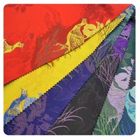 Nouvelle arrivée polyester tissé métallique phoenix conception jacquard brocart tissu pour les femmes robe formelle