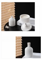 Vente en gros de contenants en céramique blanche les plus vendus Diffuseur d'huiles essentielles Diffuseur en céramique 180ml Ensemble de diffuseurs à roseaux de luxe