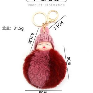 Porte-clés pendentif en peluche pompon mignon et moelleux, en forme de poupée bébé endormie colorée, avec boule de poils, jouet pour sac - Product Image 1