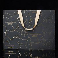 Sac de shopping de luxe en papier noir haut de gamme avec estampage à chaud motif constellation et poignée en ruban pour emballage cadeau bijoux et produits de beauté