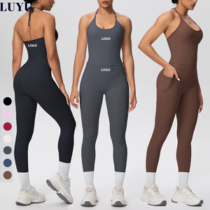 Nuovi Arrivi: Set Sportivo da Donna Alla Moda con Top Halter Allacciato e Leggings con Tasche Laterali, Completo Fitness e Yoga Personalizzabile - Product Image 1