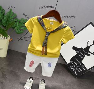 Vêtements d'été pour enfants, ensembles de vêtements assortis, produit thaïlandais, comprenant un t-shirt jaune et un pantalon blanc - Product Image 1