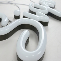 Lettres en acier inoxydable personnalisées avec éclairage au néon LED, résistantes aux intempéries IP65, montées au mur, fabriquées via un procédé de résine de surface, marque KMT