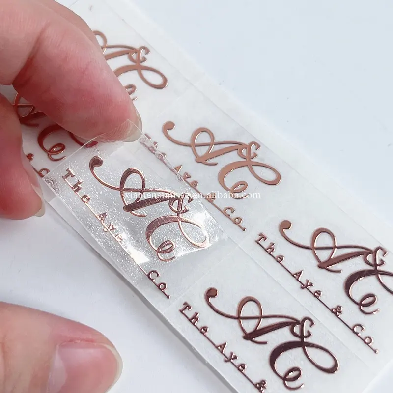 Custom Transparent label sticker with UV transfer rose gold logo