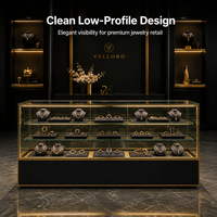 Comptoir de présentation de bijoux noir mat avec finition dorée, vitrine LED, étagères en verre pour magasin de détail