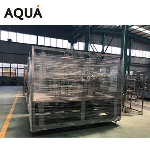 Machine de remplissage et de bouchage automatique de petites bouteilles d'eau minérale conforme à la norme CE avec commande par servomoteur - Product Image 4