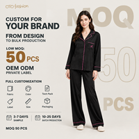 Ensemble deux pièces pour femme noir et rose avec passepoil, col cranté, manches longues, pantalon large, vêtements de détente, personnalisable OEM, vente en gros