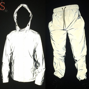 Conjuntos Deportivos Unisex al por Mayor, Chaqueta Reflectante, Pantalones de Nylon Cortavientos para Hombre, Pantalones Deportivos para Mujer - Product Image 1