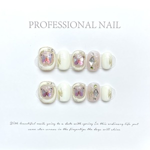 Ongles courts carrés-ovales faits à la main, effet papillon laser blanc, bordure dorée et cristaux, style français élégant et chic - Product Image 4