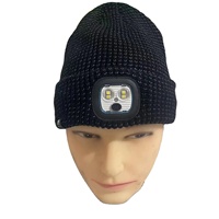 Berretto da corsa invernale personalizzato in maglia notturna in acrilico con teschio riflettente con Logo accogliente con archi a LED per uso da spiaggia