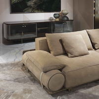 Canapé d'angle haut de gamme à dossier bas, design élégant et moderne, en cuir véritable gris clair avec accoudoirs roulés pour salons élégants