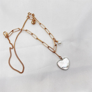 Fournisseur de bracelets pendentifs RFID NFC en métal doré avec logo personnalisé, MOQ flexible, mini étiquette, 144 octets de mémoire utilisateur, longueur personnalisable - Product Image 1