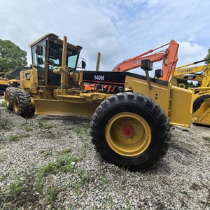 Prix raisonnable Niveleuse à roues d'occasion de haute qualité Caterpillar 140H 140G 140K Construction Mining Machine de terrassement à vendre - Product Image 1