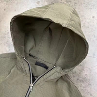 Veste coupe-vent en nylon ripstop à carreaux avec capuche à revers élastique de luxe sur mesure pour homme