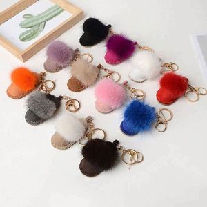 Porte-clés en fourrure de vison véritable de haute qualité, petits pendentifs en forme de pantoufles, accessoires pour sacs, fourrure mignonne - Product Image 1