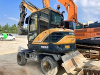 Mini-excavatrice hydraulique d'occasion Hyundai HW60 de 6 tonnes avec tarière, pince et brise-roche, certifiée CE