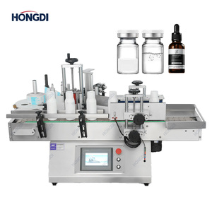 Aplicador de etiquetas de botellas redondas compactas Etiquetado de alta velocidad para una producción rápida - Product Image 1