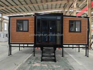 บ้านตู้คอนเทนเนอร์แบบขยายได้สำหรับโรงแรม โครงสร้างเหล็กและไม้แบบแผงแซนวิช ได้รับการรับรองมาตรฐาน CE ใช้สำหรับวิลล่ากลางแจ้ง พร้อมผนังกระจก - Product Image 2