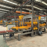 Machine automatique hydraulique de fabrication de briques QT4-15, machine de fabrication de blocs de béton creux et de pavés colorés à bon prix