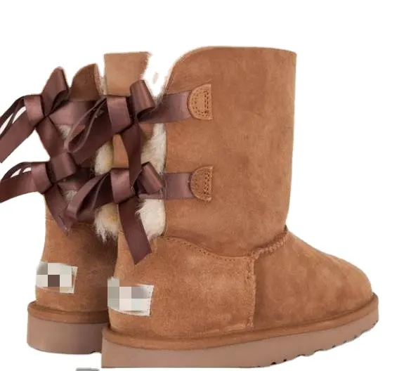 Zapatos de piel de oveja para mujer, botas de nieve de invierno, piel de oveja con dos lazos