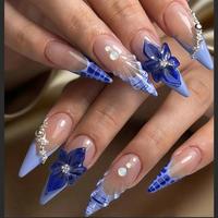 Ongles artificiels en acrylique faits à la main, forme stiletto, couleur nude, design feuille bleu roi et paillettes argentées, réutilisables