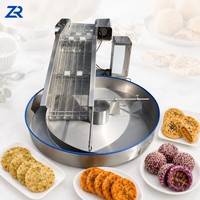 Machine de revêtement automatique à rotation rapide pour snacks, boules de fromage et boules de chocolat, avec revêtement uniforme en poudre