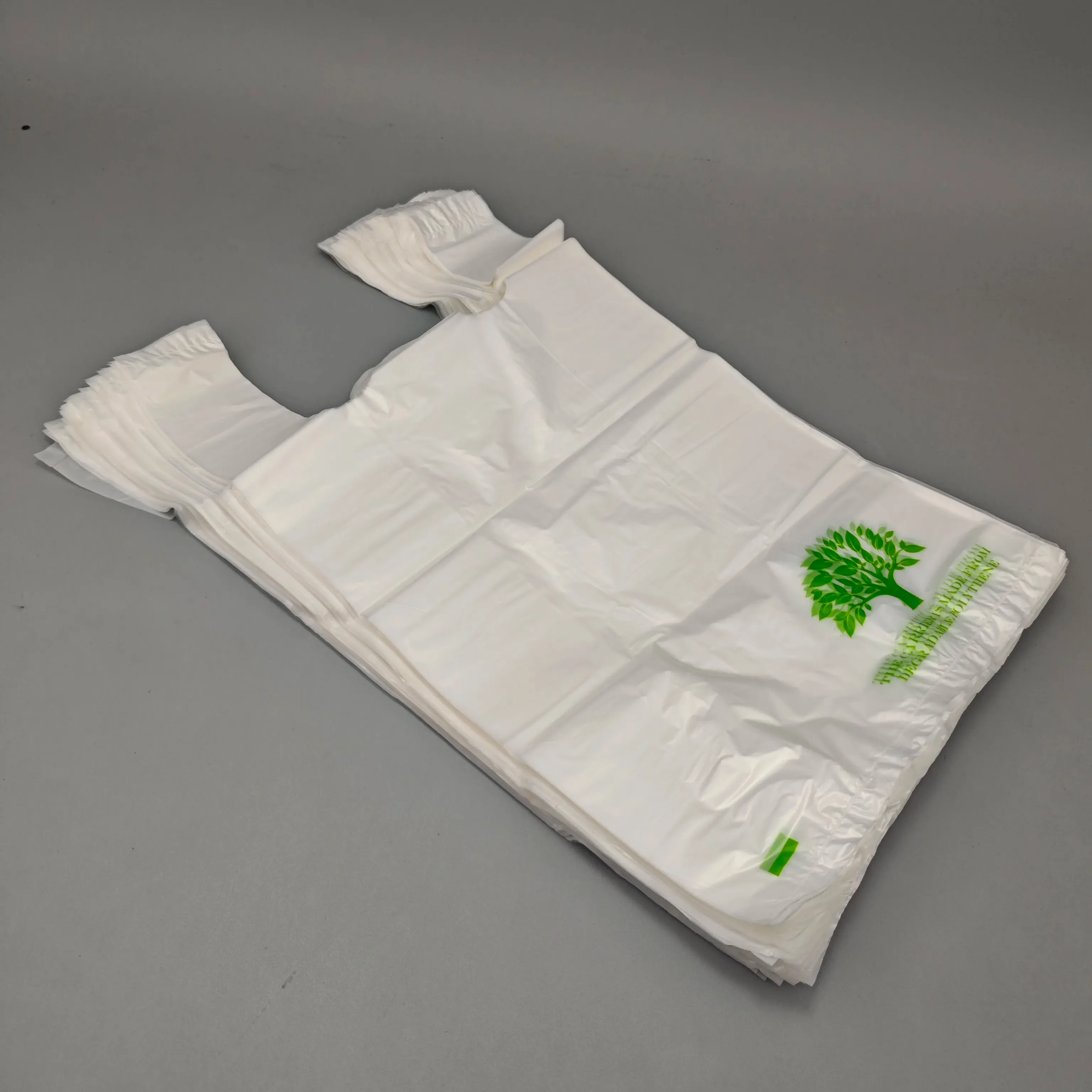 Stoktaki mallar yarı parçalanabilir tshirt bio parçalanabilir compostable alışveriş çantaları doğada çözünebilir plastik torba