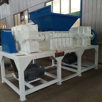 Broyeur automatique de recyclage de pneus de camion à double arbre avec broyeur