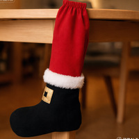 Lot de 4 housses de pieds de table de Noël en peluche non tissée, fabriquées en Chine, pour restaurants et bars, idéales comme cadeau décoratif transfrontalier