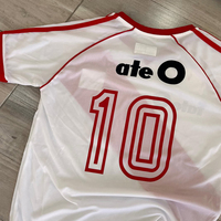 Fournisseur de maillots de football sportifs imprimés en polyester 100% surdimensionnés en tricot Dryfit pour hommes personnalisés