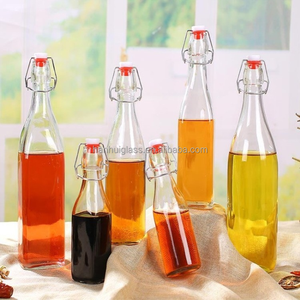 Bouteilles en verre transparent à bouchon basculant pour le lait, la bière et les spiritueux - Bouteilles en verre durables et écologiques, taille personnalisée - Product Image 5