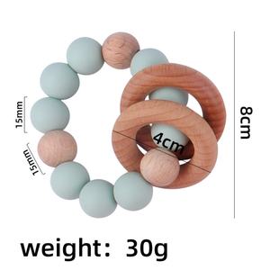 Vente en gros <span class=keywords><strong>Anneau</strong></span> <span class=keywords><strong>de</strong></span> <span class=keywords><strong>dentition</strong></span> pour bébé en silicone <span class=keywords><strong>de</strong></span> qualité alimentaire sans BPA Jouets sensoriels <span class=keywords><strong>Anneau</strong></span> en bois Perles <span class=keywords><strong>de</strong></span> silicone Jouet <span class=keywords><strong>de</strong></span> <span class=keywords><strong>dentition</strong></span> rond pour bébé - Product Image 6