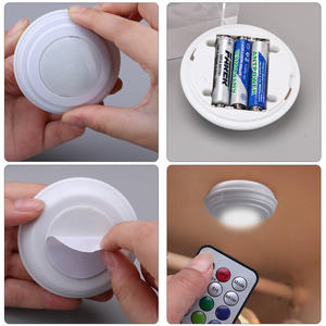 Luz nocturna LED redonda de colores con control remoto ambiental, funciona con pilas, sensor táctil, para decoración de pasillos y gabinetes. - Product Image 2