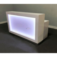 Comptoir de caisse en surface solide/marbre artificiel au design de motif rétroéclairé charmant