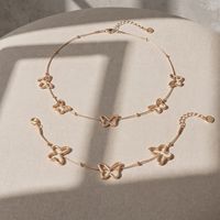 Collier ras du cou et bracelet assorti en acier inoxydable avec pendentif papillon ajouré, bijoux élégants pour femme, idéal pour les fêtes estivales, cadeau