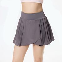Jupe-short plissée pour femme avec short intégré à ourlet croisé, anti-exposition, séchage rapide, taille haute, pour le golf, la course et le sport, en gros