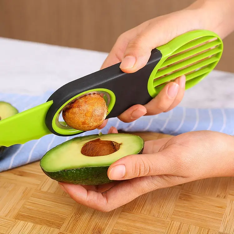 Utensilio de cocina de grado alimenticio, herramienta 3 en 1 de color verde, removedor de núcleo de fruta, cuchillo de aguacate, cortador, barato