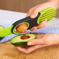 Hot barato grau alimentício 3 em 1 ferramenta utensílio de cozinha cor verde frutas núcleo removedor de abacate slicer cortador