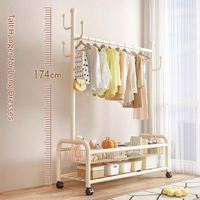 Perchero de ropa negro obsidiana con ruedas y doble malla para zapatos y ropa, para dormitorio juvenil, perchero resistente