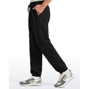 Pantalones deportivos de cintura media, antiarrugas, suaves, de secado rápido para hombre, pantalones deportivos clásicos para hombre con tela transpirable y de ajuste relajado. - Product Image 5