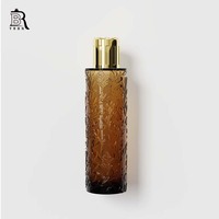 Flacon de parfum en verre de luxe en gros pour fabricants - Bouteille en verre de 100 ml avec logo personnalisé