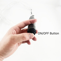 Boucles d'oreilles couronne lumineuses directement de l'usine pour les fêtes, idéales pour les cadeaux de fête LED et les nouveautés lumineuses LED en gros, ainsi que des boucles d'oreilles LED