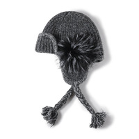 Gorro de invierno de punto con orejeras y pompón de piel sintética para mujer, con borlas trenzadas, venta al por mayor