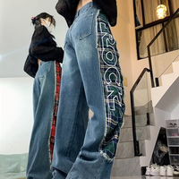 Jeans en denim déchiré à patchwork asymétrique à carreaux rétro Y2K brodés à blocs de couleur Jeans pour femmes élégants à ourlet brut Pantalons cargo amples