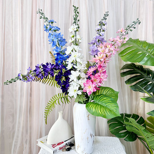 Fleurs artificielles Queyiyi en forme de queue d'hirondelle, en soie, blanches, roses, bleues, violettes, pour décoration de mariage et de la maison - Product Image 1