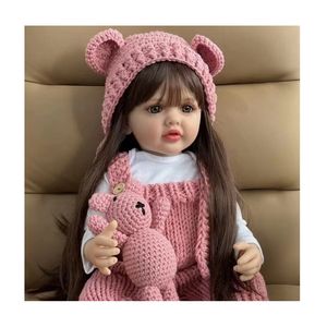 Yeezwood Bestseller 55CM Silikon Reborn Babypuppe Kleinkind Geschenkset Reborn Puppe mit Plüschtieren - Product Image 1